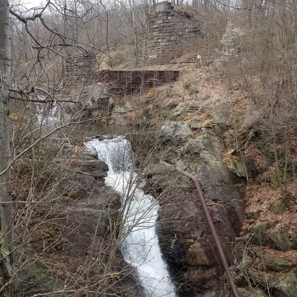 A photograph taken in April 2020 detailing the waterfall along the Solomon Creek in Ashley, PA, which supplied water to the Huber Breaker's power plant.
