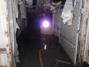 Bobbing down the flooded steam tunnel.